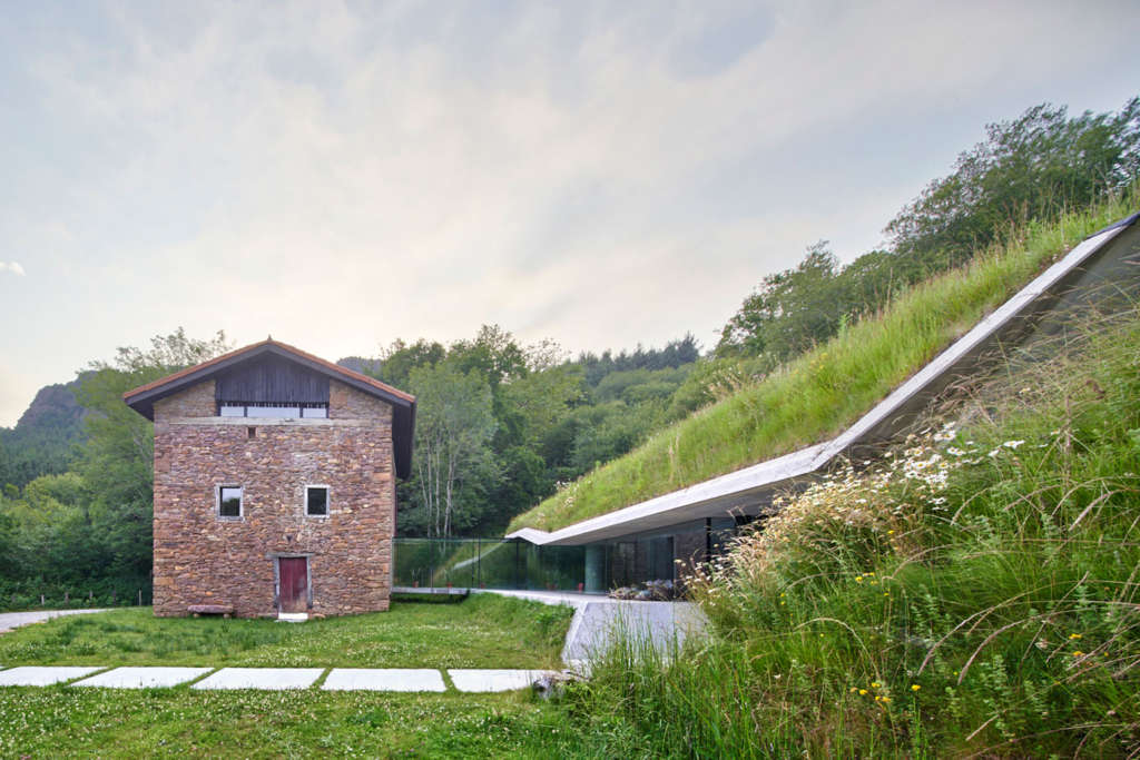 This hideaway home is nestled into the Navarre mountains