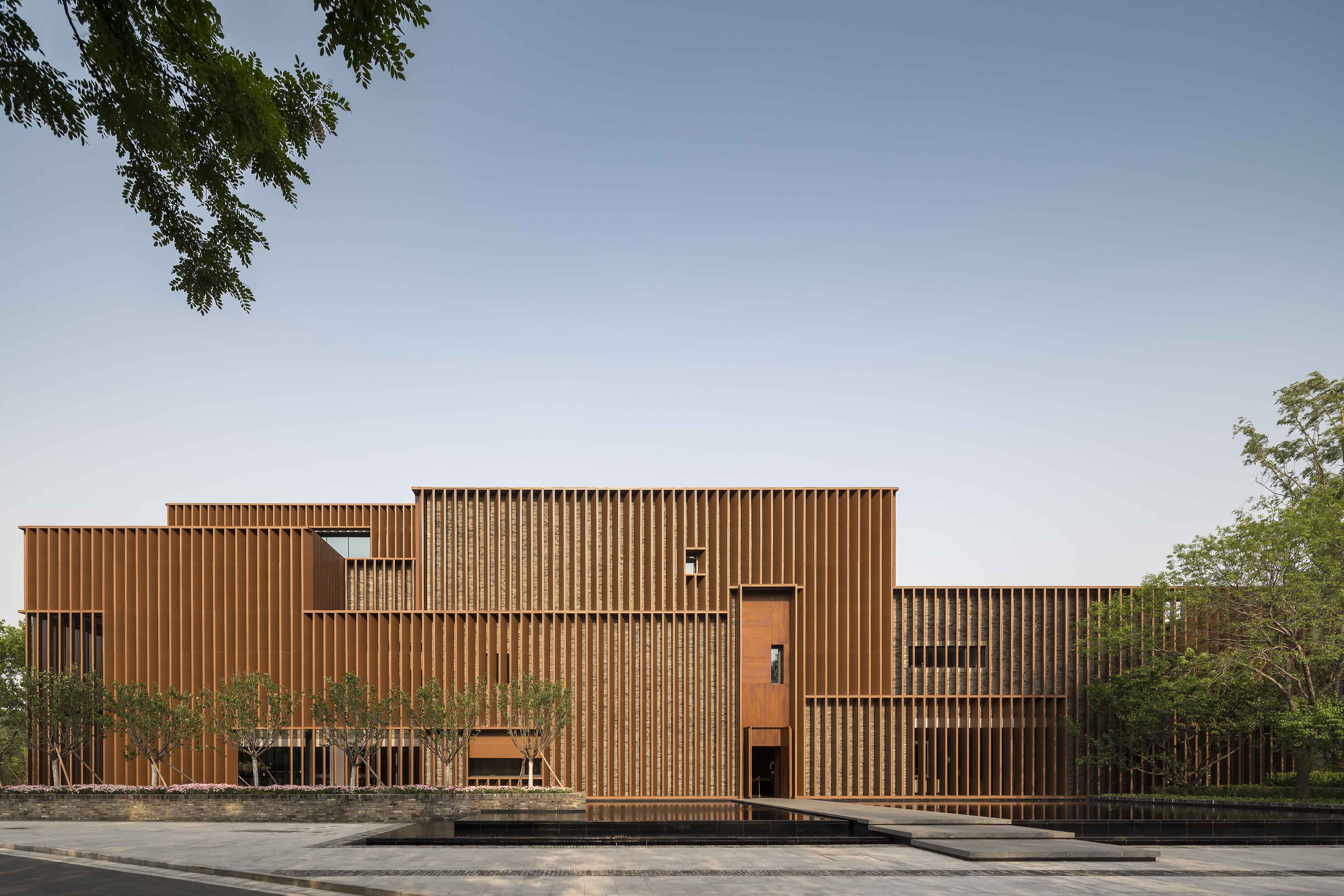 Neri&Hu design shimmering metal and brick cultural center on the outskirts of Beijing