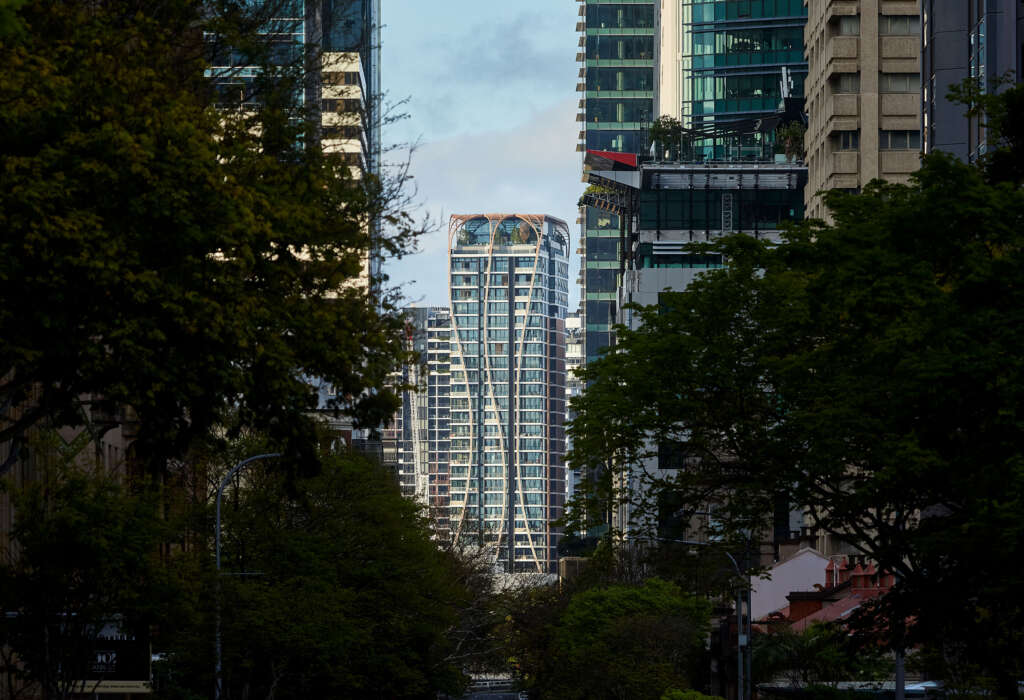 Koichi Takada Architects design residential tower featuring a five-story indigenous artwork on its façade