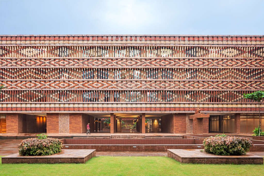 Studio Lotus design government building in India with ornate brick louvres and hand-carved stone