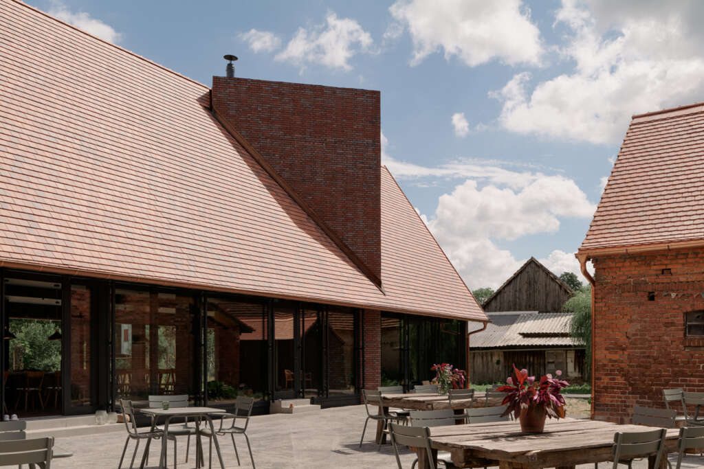 Sigurd Larsen design brick and wood building for Michelberger Farm