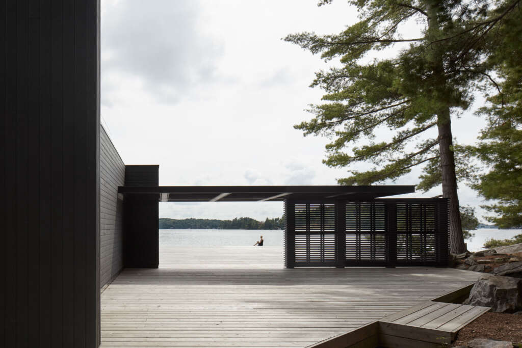 This boathouse was inspired by the wood docks found along the edges of the Muskoka lakes