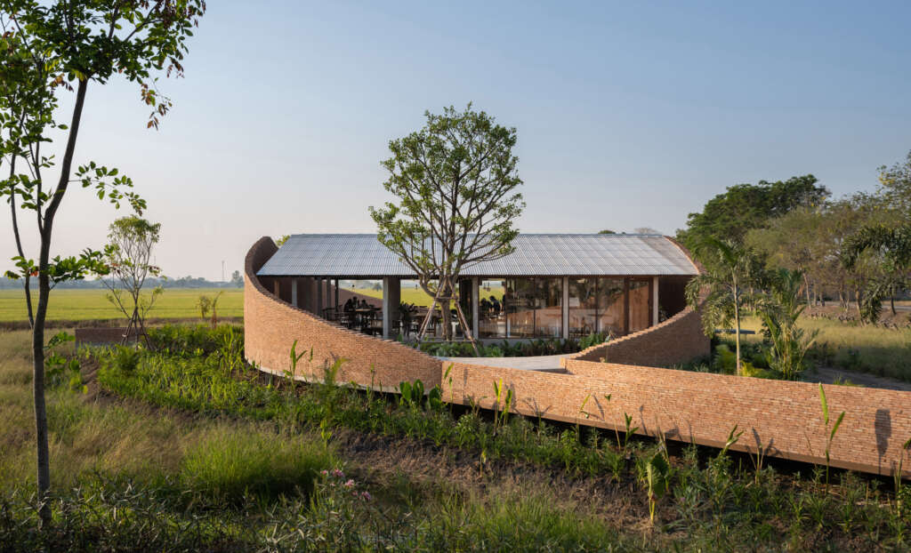 BodinChapa Architects design brick cafe that co-exists with paddy field in Thailand