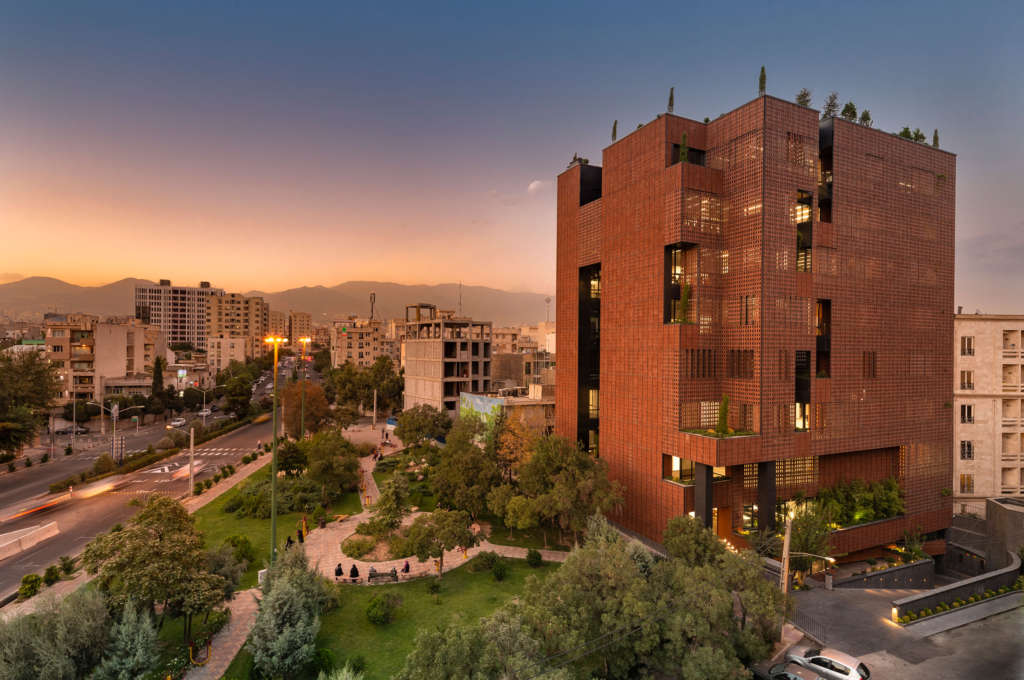 This office building in Tehran uses hollow brick technology to connect with the city
