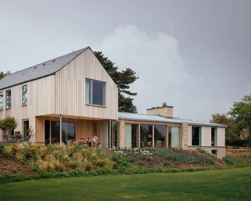 Oliver Leech Architects complete low-energy home overlooking a small rural English village