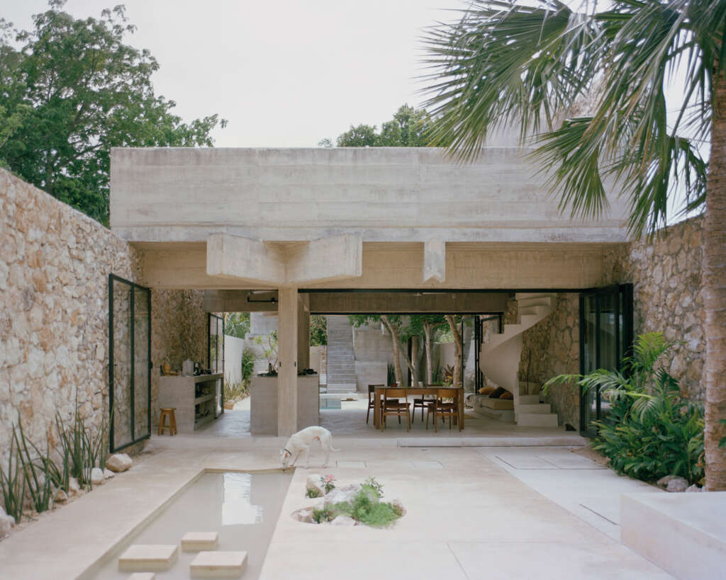 This house in Yucata, Mexico is designed as a series of pavilions connected by water