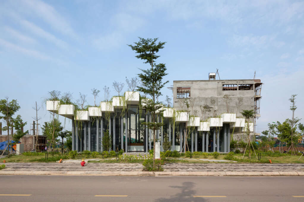 ARO studio completes undulating green roof for showroom in Vietnam
