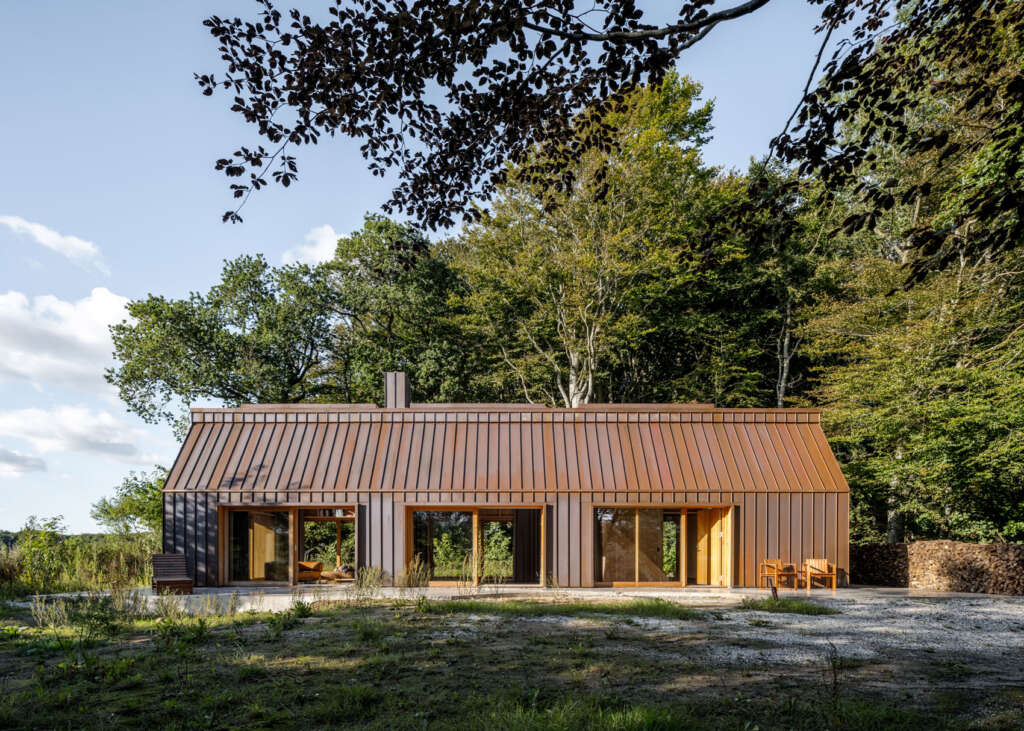 This house for an author is made of stone, wood and copper