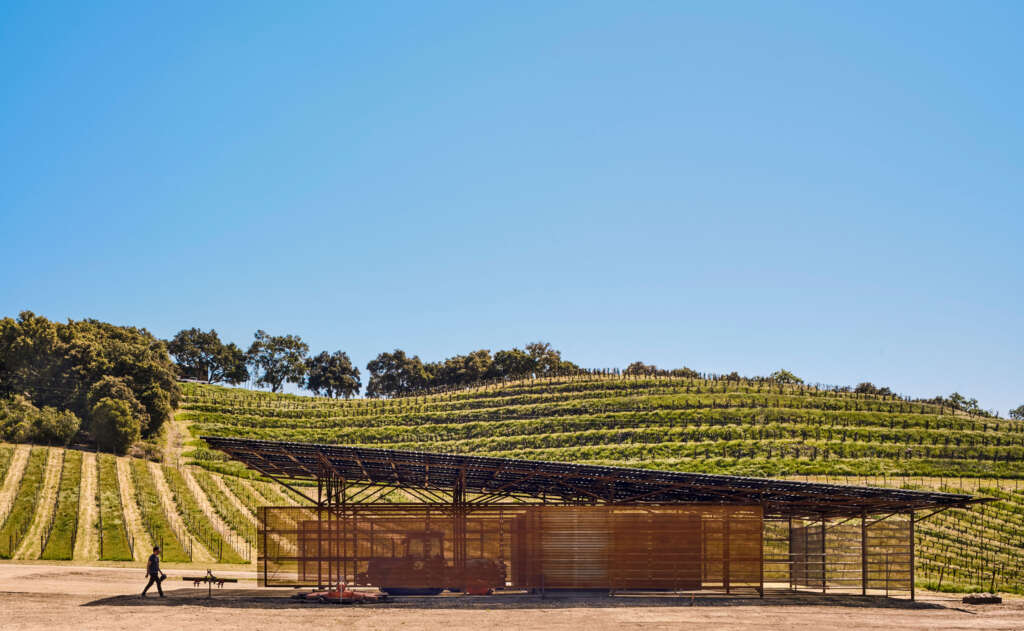 This simple agricultural barn by Clayton Korte is constructed out of recycled oilfield pipes