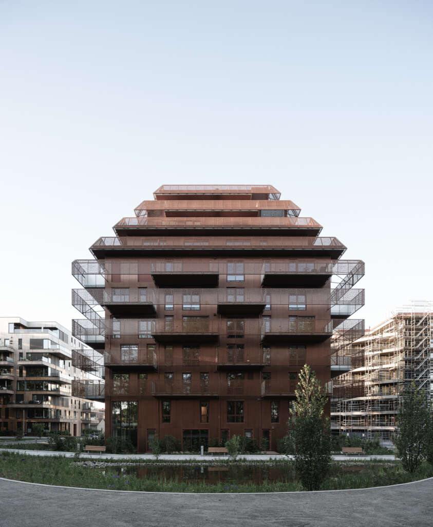 Reiulf Ramstad Arkitekter design housing project in Norway with perforated copper plates