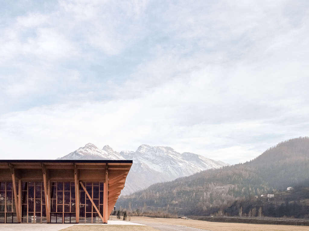 Agordo congress and exhibition centre blends into Italian mountain landscape