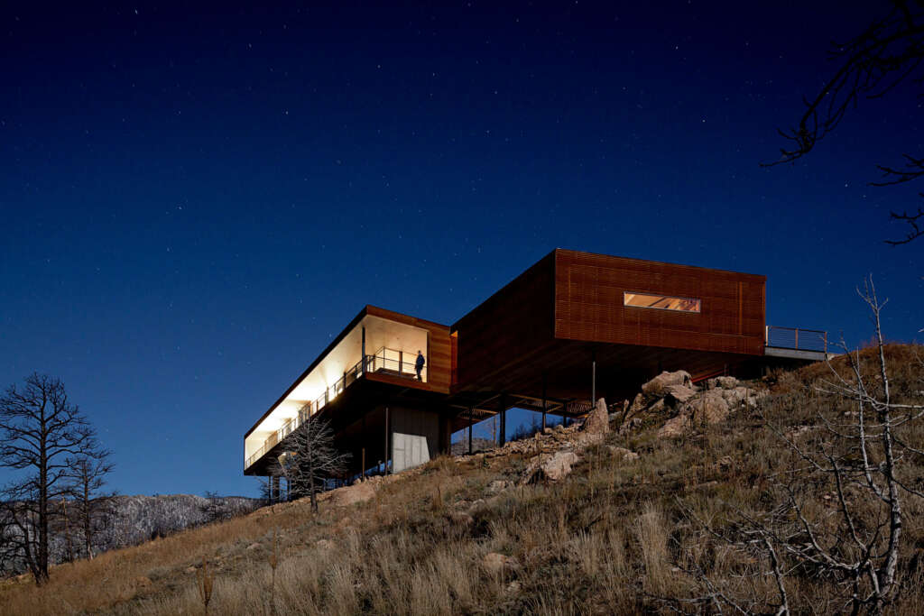 Hacker designs dramatic corrugated steel house overlooking the Sunshine Canyon in Colorado