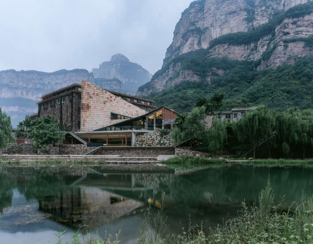 This stunning new art museum in Henan Province repairs the "texture" of the surrounding village by activating old warehouses
