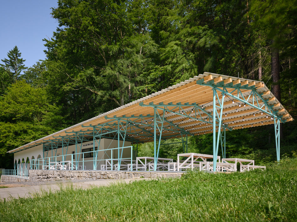 Mjölk architekti and Marie Vondráková design a public pool set within a forest