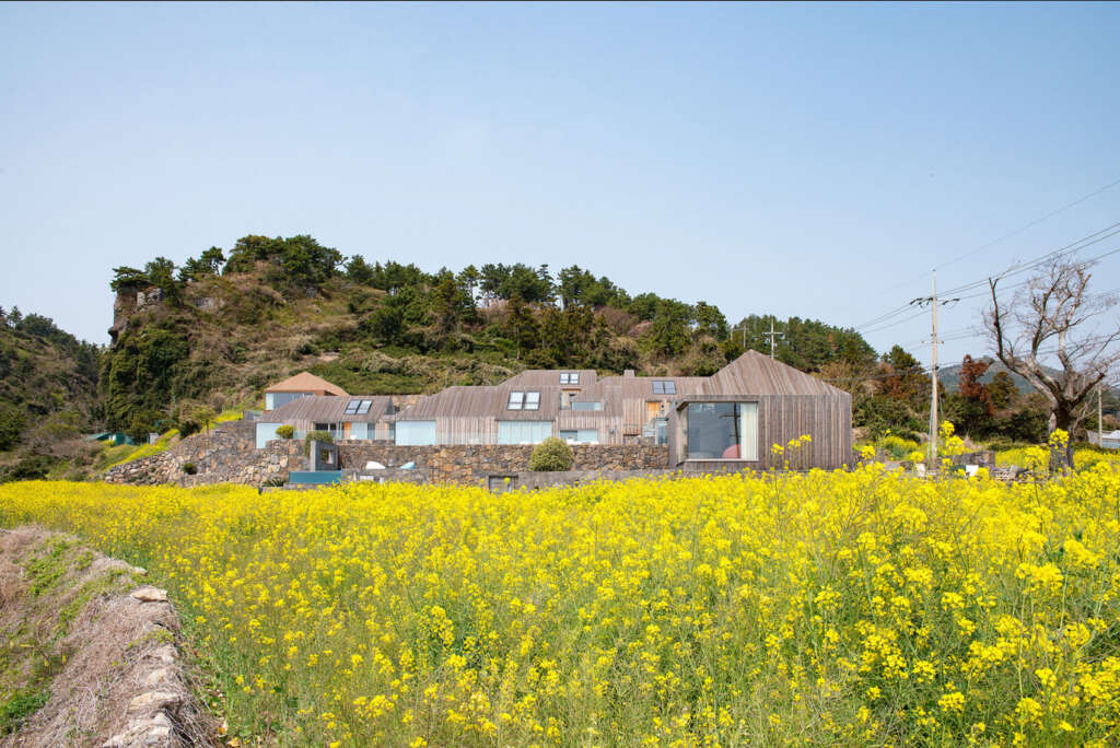 Doojin Hwang Architects design small village of houses overlooking the Pacific coast in Jeju-si, South Korea