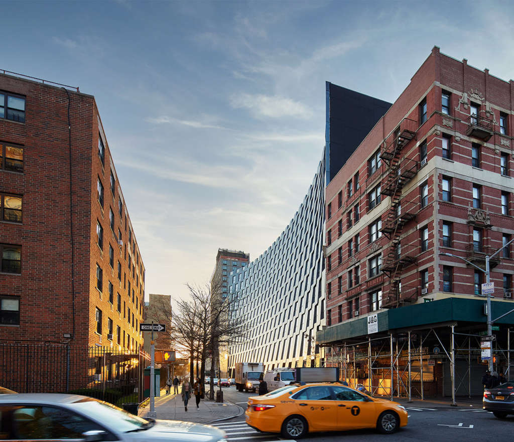 BIG reinterprets a 100+ year zoning law in the heart of Harlem called "The Smile"
