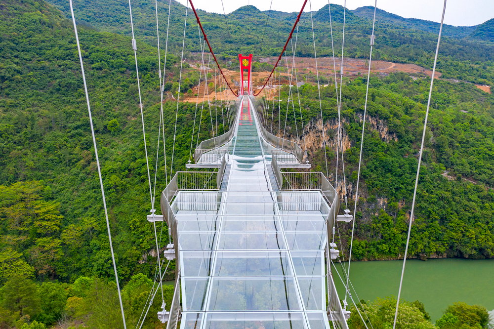 Majestic Glass Bridge Opens In The Huangchuan Three Gorges Scenic Area 