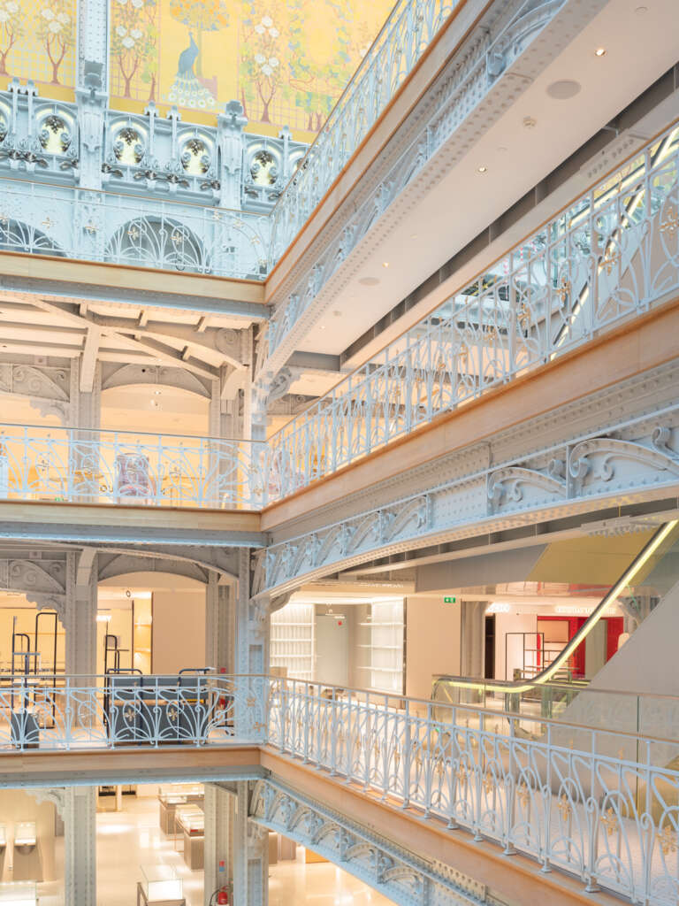 Art nouveau frescos adorn the main atrium inside the Samaritaine